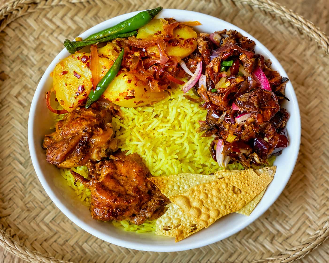 Sri Lankan rice and curry table with side dishes