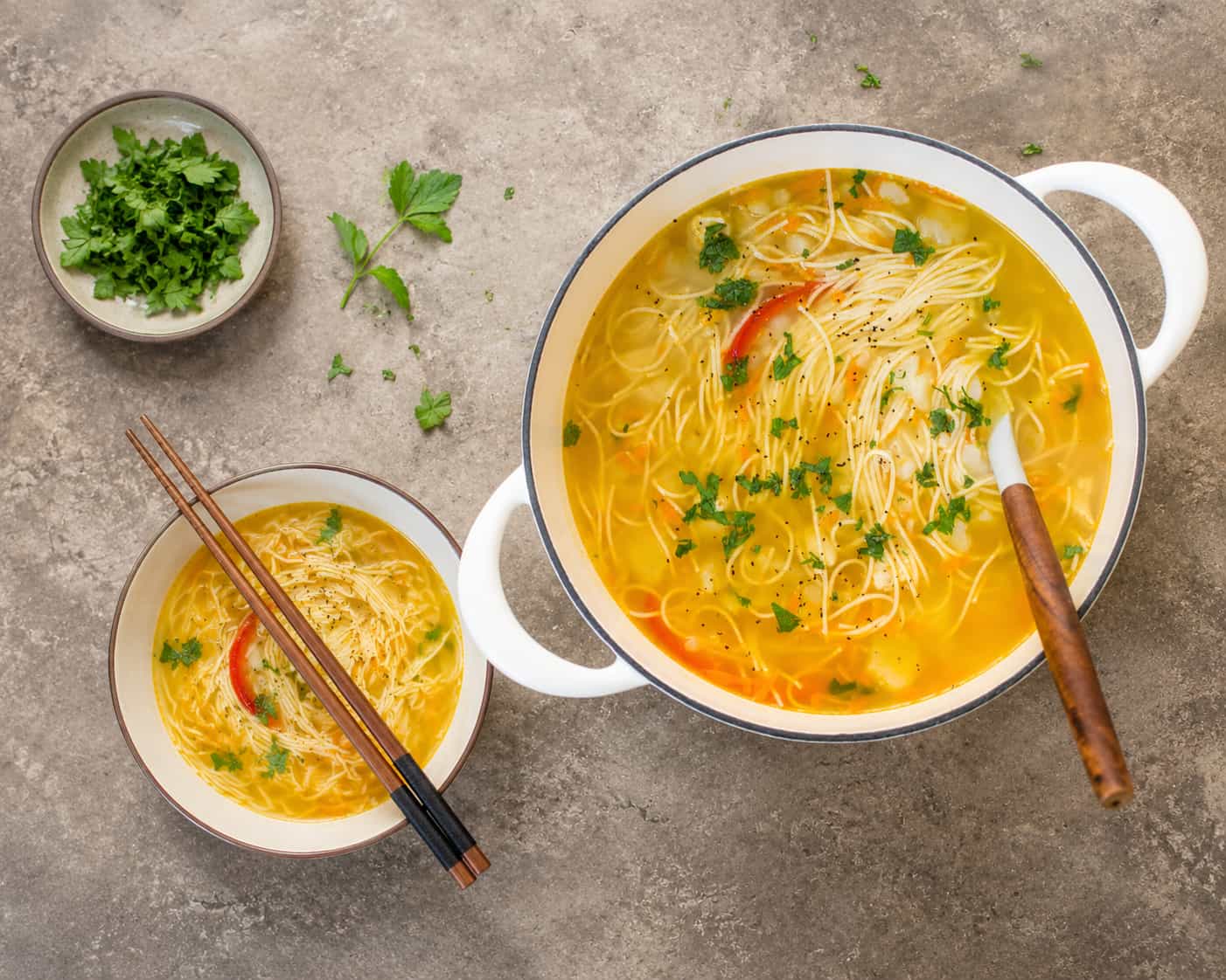 Stir-frying noodles in a pan